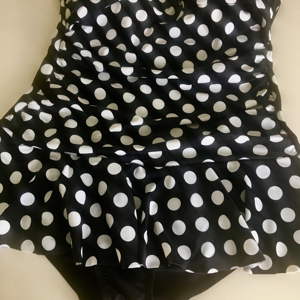 Polka dot bathing suit. Very slimming!